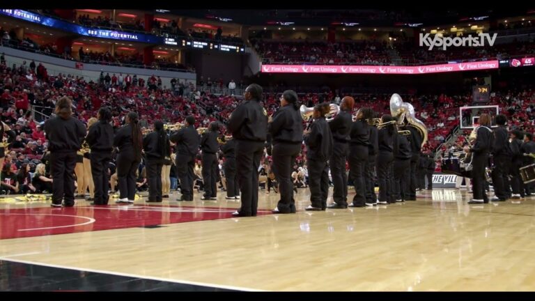Central HS Yellow Jackets Marching Band Performs In KFC Yum Center